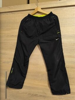 Dívčí kalhoty s podšívkou,zn.NIKE,vel.158/164