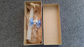 Skleněný svícen se svíčkou