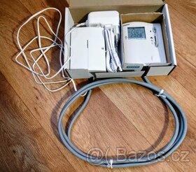 Univerzální GSM komunikátor a prostorový termostat