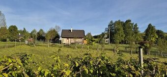 Novostavba roubené chalupy v obci Kytlice