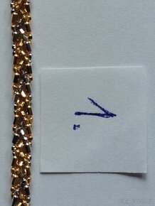 Zlatý řetízek na ruku z 18k zlata.