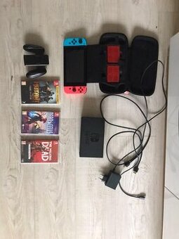 Nintendo switch + hry a obal