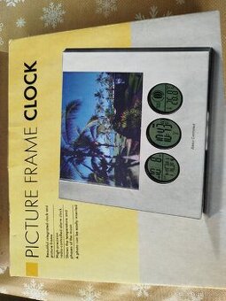 Prodám hodiny s fotorámečkem za 180