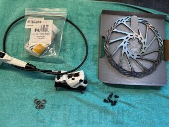 Přední  brzda Elixir 5 a Shimano klika s přsnykačem Slx