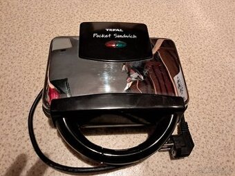 Toustovač s poškozeným zavíráním Tefal