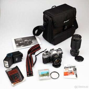 Canon AE-1 + dva objektivy + příslušenství