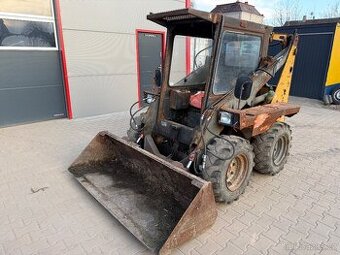 UNC 060 smykovy nakladač