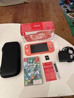 Nintendo switch LITE + hra + sd karta (V ZÁRUCE)