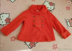 Červený kabátek Next