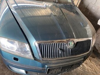 Octavia 2 facelift,1,6i,75KW,kód barvy 9598