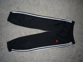 Černé sportovní tepláky zn Adidas vel 140