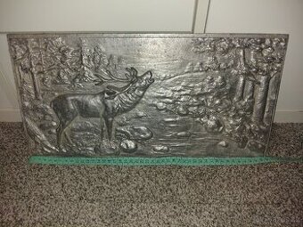 Reliefní obraz jelen v říji