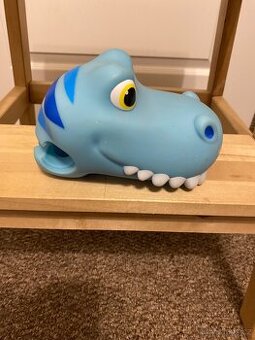 Hlava dinosaura na řídítka koloběžky