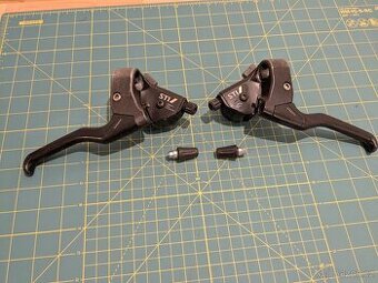 Řadící a brzdové páčky Shimano ST-M050 (3x7)