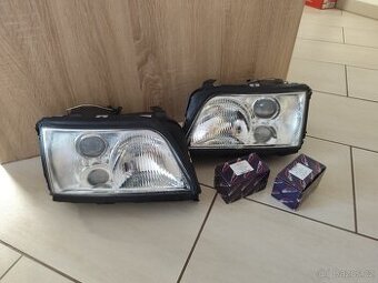 Přední světla Audi A6 C4