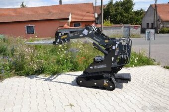 Prodám pásový, smykem řízený nakladač s paletovými vidlemi