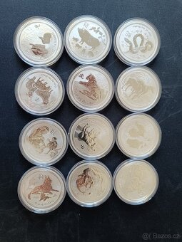 Sada 12 mincí Lunární série II. 1 Oz. Čisté stříbro.