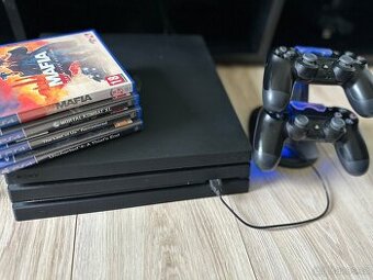 Playstation Pro 4 + 2 ovladače + 4 hry