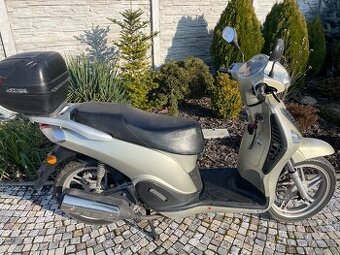 CF MOTO 125 ccm wallstreet pouhych 7000 km
