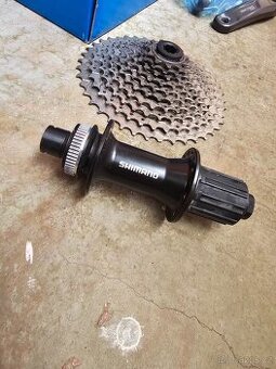 Prodám zadní náboj SHIMANO FH-MT400-B, 32H, CENTER LOCK, 12