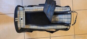 Přenosná látková taška.