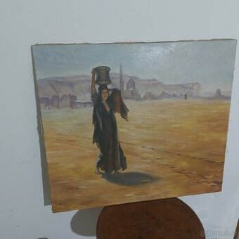 Arabská žena s nádobou na vodu