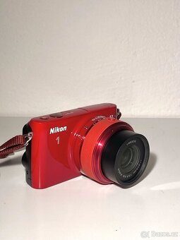 Nikon 1 S2 červený + objektiv 11–27.5m výborný stav