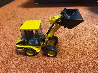 Bagr Bruder nakladač Caterpillar