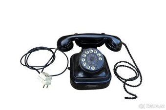 Starožitný stolní bakelitový telefon
