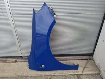 Pravý přední blatník Škoda Fabia II před facelift