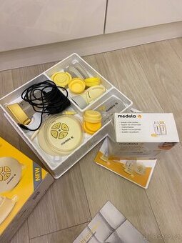 Elektronická odsávačka Medela