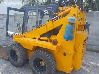 Prodám smykem řízený nakladač UNC-060 stav dobrý vše původn