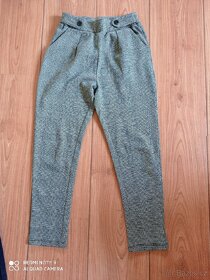 Prodám dívčí kalhoty 140