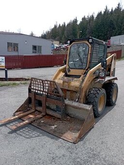CAT 242 - 1
