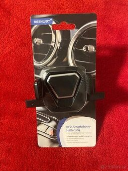 Držák na mobil do mřížky v autě