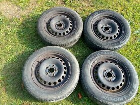 VW 15"plechové disky se zimními koly.