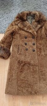 Dlouhý dámský kožich