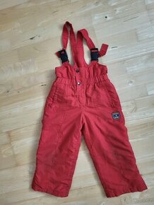 Dětské červené lyžařské kalhoty velikost 104