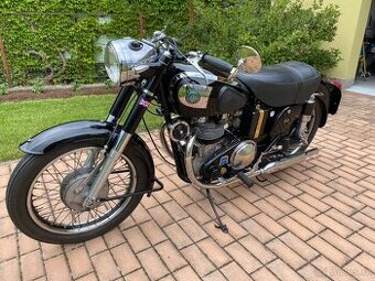 AJS