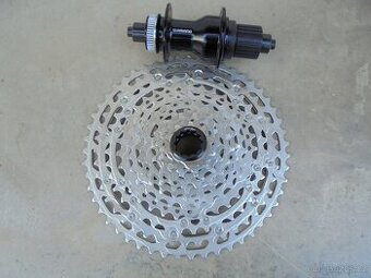 Kazeta Sh. DEORE MicroSpline 12 speed. + Náboj Sh.