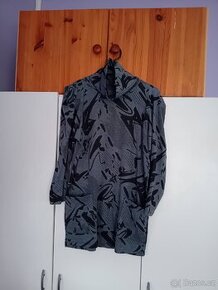 Šedý rolák s kapsami