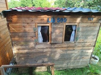 Dětský dřevěný zahradní domek