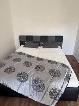 Postel Nice 180x200 cm, černá ekokůže/antracitová tkanina