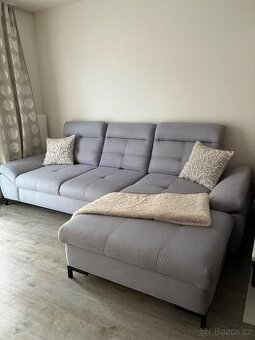 Rohová rozkládací sedací souprava