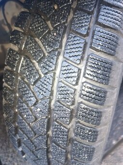 GM Opel. Plechové disky , poklice a zánovní zimní pneu