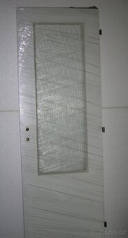 Dveře vnitřní nové nepoužité, bílé, slonová kost, kašírované