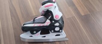 Lední brusle rostoucí 31-34 ,pěkný stav