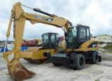 CATERPILLAR M313D - kolové rýpadlo,
