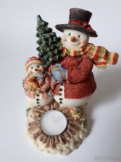 Vánoční sněhuláci s čajovou svíčkou.