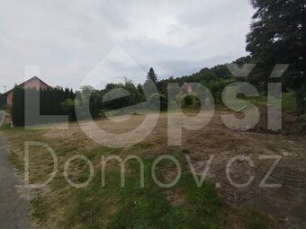 Prodej stavební parcely a dvou garáží v obci Vápenná